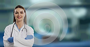 Portrait of caucasian female doctor with arms crossed smiling against hospital in background