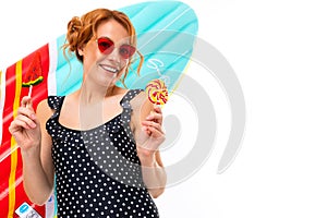 Cheerful woman with fair red hair in swimsuit, picture isolated on white background