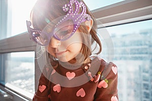 Portrait of Caucasian girl chil with funny glasses