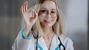 Portrait caucasian happy successful doctor practitioner specialist therapist nurse medical worker woman in glasses