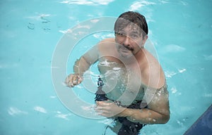 Portrait of Caucasian male in pool