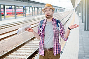 Portrait of caucasian male in railway train station