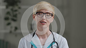 Portrait caucasian mature 40s woman doctor female surgeon medical worker nurse practitioner with short hair wears