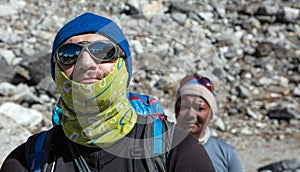 Portrait of caucasian Mountain Climber and nepalese Guide