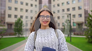 Portrait of caucasian university teenager girl female student studying