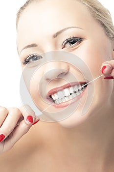 Portrait of Caucasian Woman Holding Dental Floss