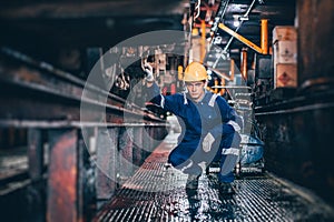 Portrait Caucasion male worker work in Locomotive Repair Shops happy smiling