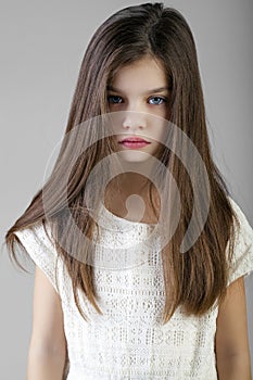 Portrait of a charming brunette little girl