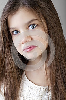 Portrait of a charming brunette little girl