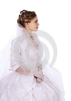 Portrait of a charming girl in a white dress in retro style, the bride in a retro dress