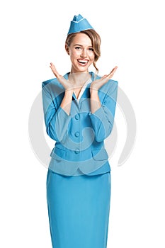 Portrait of charming stewardess wearing in blue uniform.