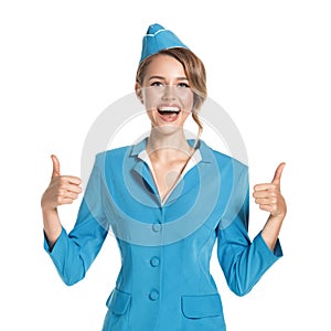 Portrait of charming stewardess wearing in blue uniform. photo