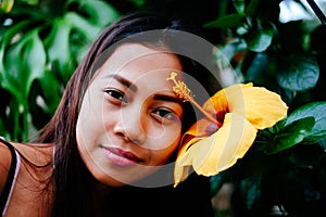 Portrait of a charming young woman in the flowered garden. Spring Fantasy