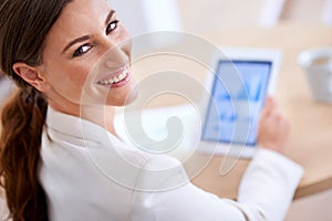 Portrait, charts and tablet of businesswoman, smile and technology with data. Statistics, graphs and planning or