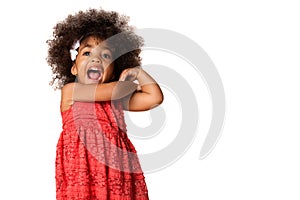 Portrait of cheerful african american little girl, isolated with copyspace photo