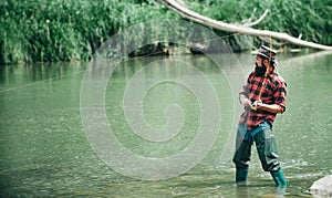 Portrait of cheerful bearded man fishing. Fisherman with fishing rod. Weekends made for fishing. Giving your hobby. With