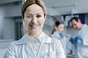 Portrait of a cheerful beautiful researcher