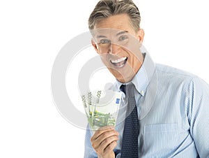 Portrait Of Cheerful Businessman Holding One Hundred Euro Banknotes