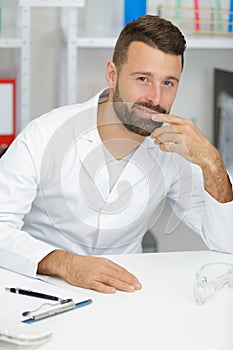 Portrait cheerful  doctor wearing white labcoat