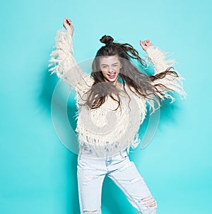 Portrait of cheerful fashion hipster girl going