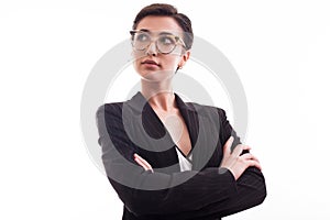 Portrait of cheerful fashion model with glasses wearing a black jacket over white background in studio