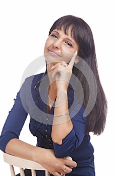 Portrait of a Cheerful Friendly Calm Brunette Woman. Isolated over White