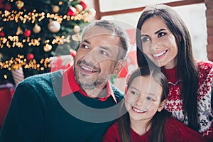 Portrait of cheerful friendly people toothy smile look interested newyear miracle tree illumination decor house indoors