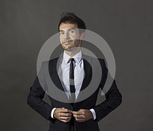 Portrait of a a cheerful gentleman in business attire.