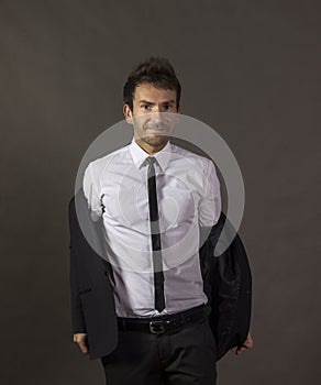 Portrait of a a cheerful gentleman in business attire.