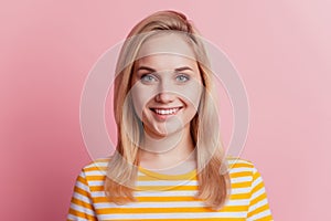 Portrait of cheerful positive girl toothy smile on pink background