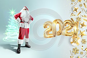 Portrait of a cheerful Santa Claus in a red suit on a light background with the gold numbers 2021.mixed media. Concept for