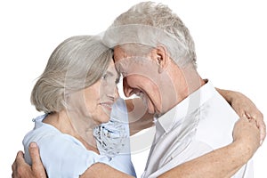 Portrait of cheerful senior couple at home