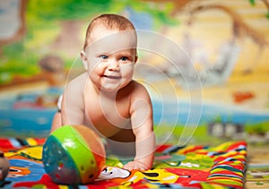 Portrait of a cheerful smiling caucasian little six-month-old girl