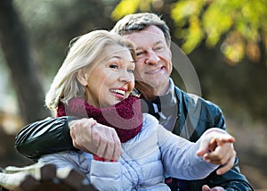 Portrait of cheerful smiling positive elderly couple