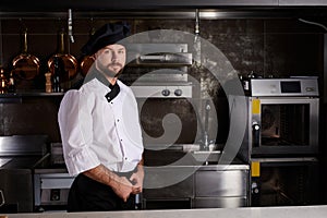 Portrait Chef Cook In White Uniform In Restaurant Kitchen At Work