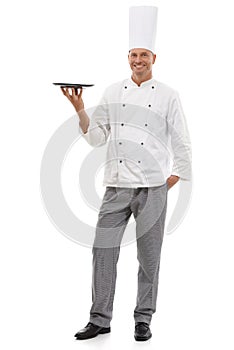 Portrait of chef holding empty tray, menu special and smile presenting promo deal or restaurant product placement. Happy