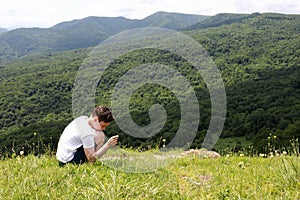 Portrait of child on Azish-Tau ridge background