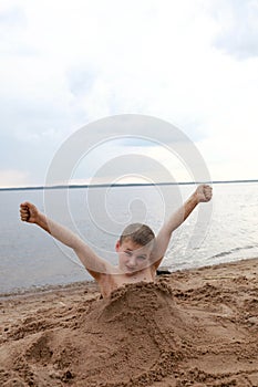 Portrait of child on beach of Lake Seliger