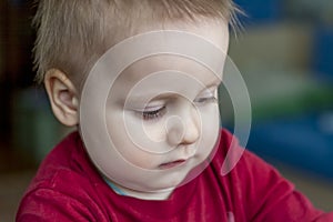 Portrait of child. Cute kid with a funny expression on his face. Funny kid.