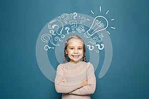 Portrait of child girl smiling. Success, idea and innovation concept