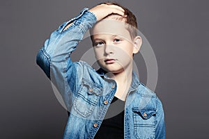 Portrait of child. handsome little boy in jeans