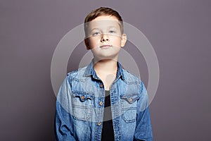Portrait of child. handsome little boy in jeans