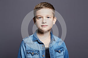 portrait of child. handsome little boy in jeans