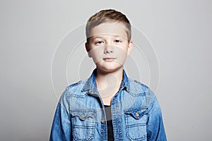 Portrait of child. handsome little boy in jeans wear