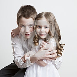 Portrait of a child, the love of brother and sister in his arms