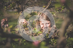 portrait of child in spring nature, relaxing and having good time