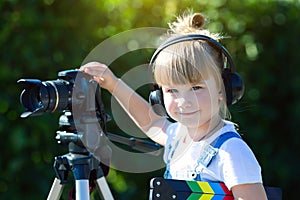 Portrait of a child with a TV clapper