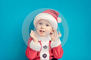 Portrait of child wearing Santa Claus costume