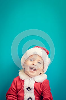 Portrait of child wearing Santa Claus costume