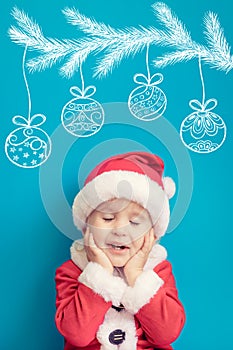 Portrait of child wearing Santa Claus costume